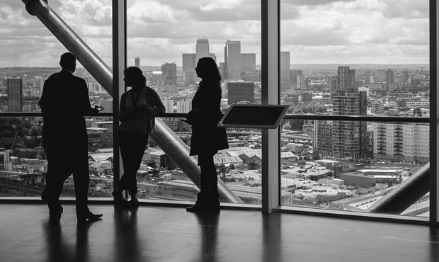 People standing in front of window